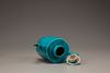 A turquoise-glazed wine pot and cover