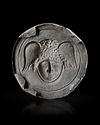 A ROMAN GILT SILVER PHALERA WITH WINGED HEAD OF MEDUSA, 1ST-2ND CENTURY AD