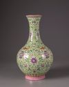 A green-ground famille-rose bottle vase