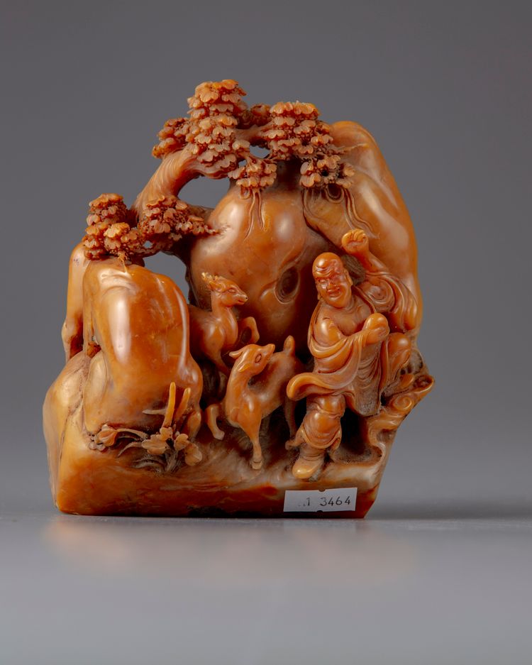 A CHINESE SOAPSTONE CARVING, 19TH CENTURY