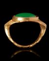 A ROMAN STYLE GOLD RING WITH A GREEN STONE, 3RD-4TH CENTURY AD OR LATER