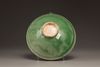 A CHINESE YAOZHOU CARVED GREEN GLAZED CONICAL BOWL, LIAO DYNASTY (907-1125)