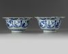 A pair of Chinese blue and white ‘floral’ klapmuts bowls
