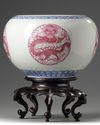 A pair of Chinese famille rose 'dragon' jardinieres