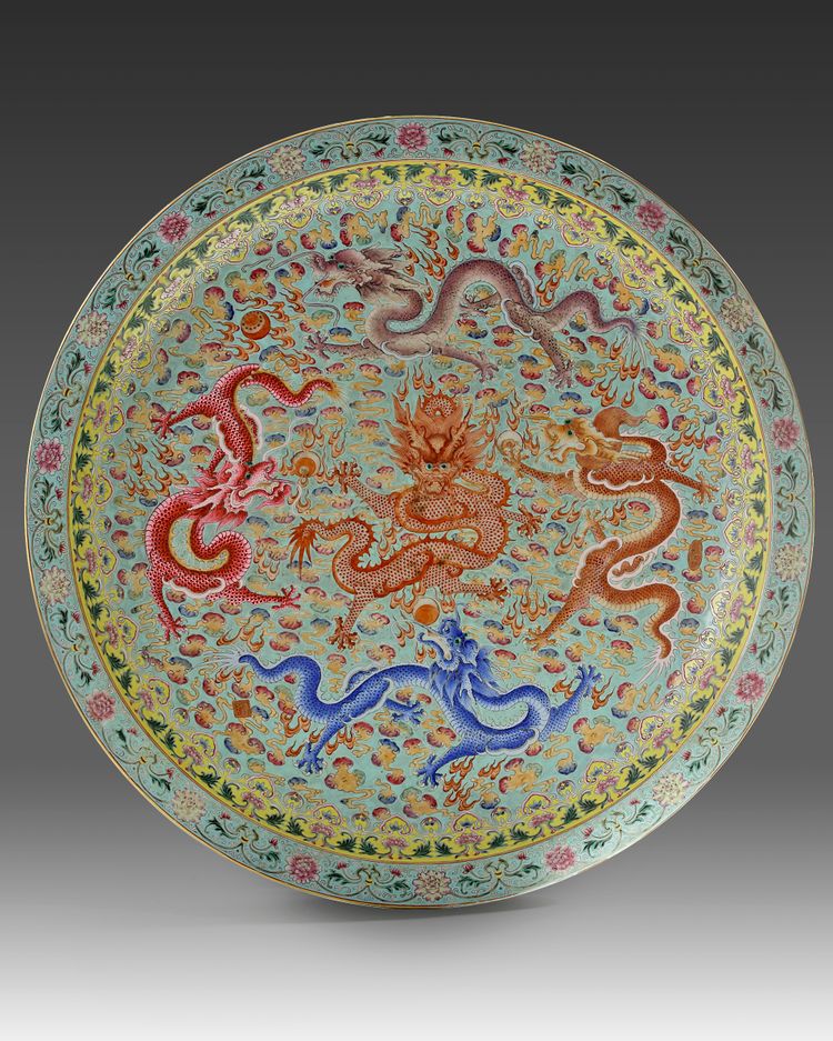 A massive Chinese famille rose 'dragon and phoenix' charger