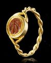 A ROMAN RED JASPER INTAGLIO OF A BEE WITH GOLD RING, CIRCA 1ST-2ND CENTURY A.D.