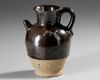A CHINESE CIZHOU WARE BLACK-GLAZED EWER (PITCHER)