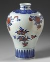 A Chinese underglaze copper red decorated blue and white meiping