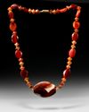 A WESTERN ASIATIC CARNELIAN NECKLACE, CIRCA 2ND CENTURY B.C.