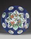 A CHINESE POWDER BLUE-GROUND FAMILLE VERTE CHARGER