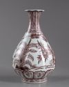 A CHINESE UNDERGLAZE COPPER-RED 'THREE FRIENDS OF WINTER' PEAR-SHAPED VASE, YUHUCHUNPING