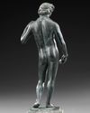 A ROMAN BRONZE STATUETTE OF APOLLO CARNEUS, CIRCA 1ST-2ND CENTURY A.D.