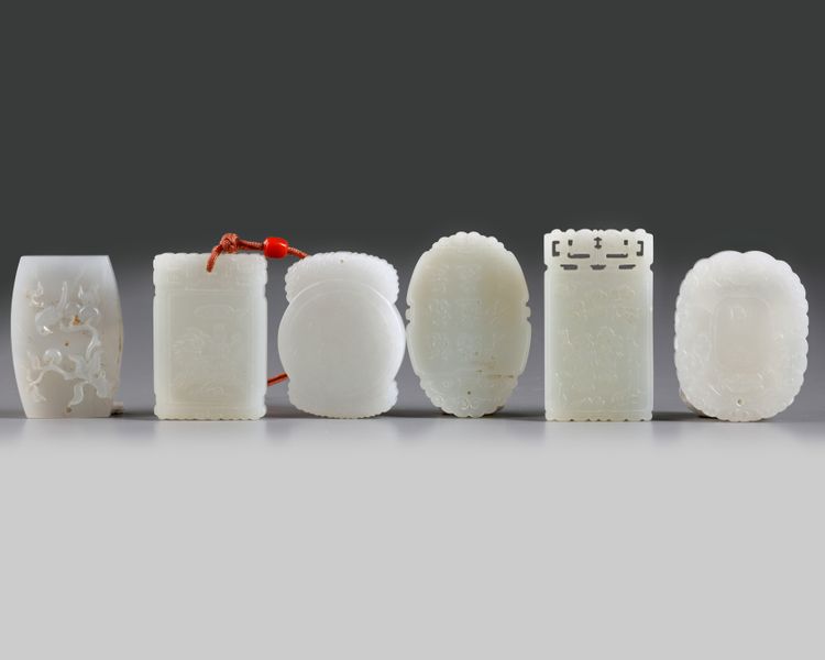 A group of six Chinese jade plaques
