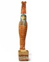 AN EGYPTIAN WOOD FIGURE OF PTAH-SOKAR-OSIRIS, LATE PERIOD, CIRCA 664-332 B.C.