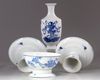 A group of four blue and white items