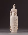 A Chinese ivory ‘chilong’ vase and cover