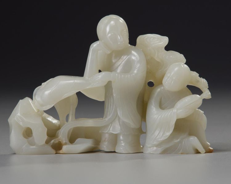 A CHINESE WHITE JADE CARVING OF THE LAUGHING TWINS