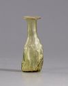 A ROMAN GLASS FLASK, CIRCA 3RD CENTURY AD