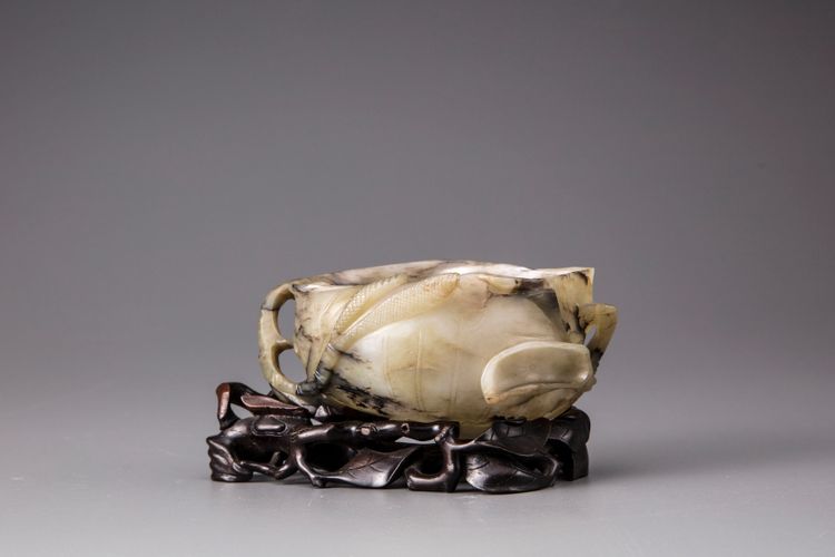 A celadon and grey jade 'lotus leaf' brush washer