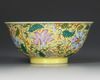 A CHINESE YELLOW-GROUND FAMILLE ROSE BOWL, QING DYNASTY (1644-1911)