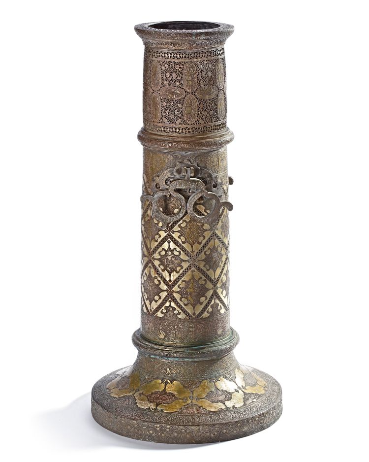 A LARGE ENGRAVED BRASS TORCH STAND, PERSIA, 19TH CENTURY
