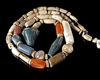 A NECKLACE OF BEADS WITH BULL HEAD PENDANT, 2ND-3RD MILLENNIUM BC
