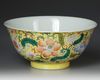A CHINESE YELLOW-GROUND FAMILLE ROSE BOWL, QING DYNASTY (1644-1911)
