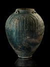 A POST SASSANIAN TURQUOISE GLAZED POTTERY STORAGE JAR, IRAN OR IRAQ, 7TH-8TH CENTURY