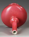 A SMALL CHINESE RUBY-GLAZED VASE, 19TH/20TH CENTURY