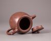 A Chinese yixing teapot and cover