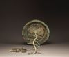 A bronze money tree