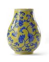 A SMALL CHINESE YELLOW GROUND HU VASE, 20TH CENTURY