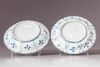 TWO CHINESE BLUE AND WHITE SAUCERS
