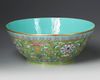 A  LARGE FAMILLE ROSE GREEN-GROUND BOWL DAOGUANG SIX-CHARACTER SEAL MARKS IN IRON RED AND OF THE PERIOD (1821-1850)