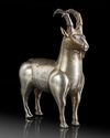 AN ACHAEMENID SILVER FIGURINE OF A MOUNTAIN GOAT (MOUFLON) 6TH CENTURY B.C