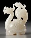 A GROUP OF CHINESE WHITE AND PALE CELADON JADE MYTHICAL BEAST CARVINGS, 20TH CENTURY