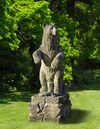 A SCULPTED LIMESTONE MODEL OF A GRIZZLY BEAR OF RECENT MANUFACTURE