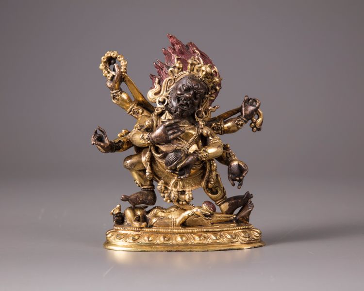 A Sino-Tibetan gilt bronze figure of Sadbhuja Mahakala