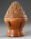 A CHINESE BROWN GLAZED BURNER, EASTERN HAN DYNASTY (25-220 AD)