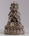 A Chinese bronze figure of a Guanyin