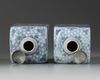 A pair of Chinese blue and white square bottles and silver covers