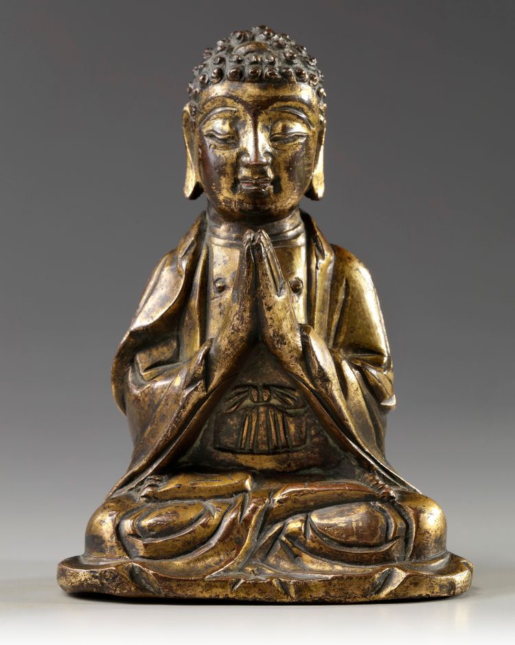 A CHINESE  GILT BRONZE FIGURE OF A BUDDHA, LATE MING DYNASTY, 17TH CENTURY