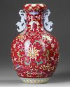A CHINESE FAMILLE ROSE RUBY GROUND VASE, 19TH-20TH CENTURY