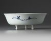 A Chinese blue and white pierced tripod basin