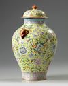 A Chinese yellow-ground famille rose 'Eight Immortals' vase and cover