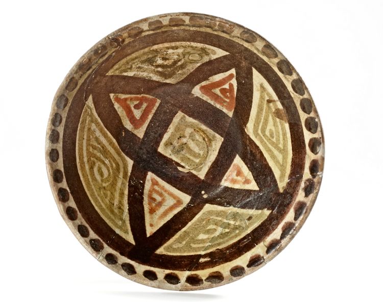 A NISHAPUR POTTERY BOWL, PERSIA, 10TH CENTURY