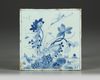 A Chinese blue and white square 'lotus and crane' tile