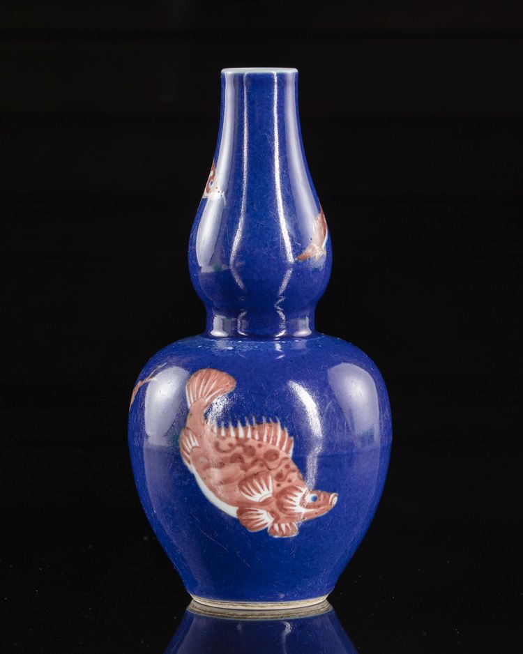 A Chinese blue ground double-gourd vase