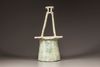 A green-glazed pottery well