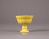 A Chinese yellow glazed stem cup